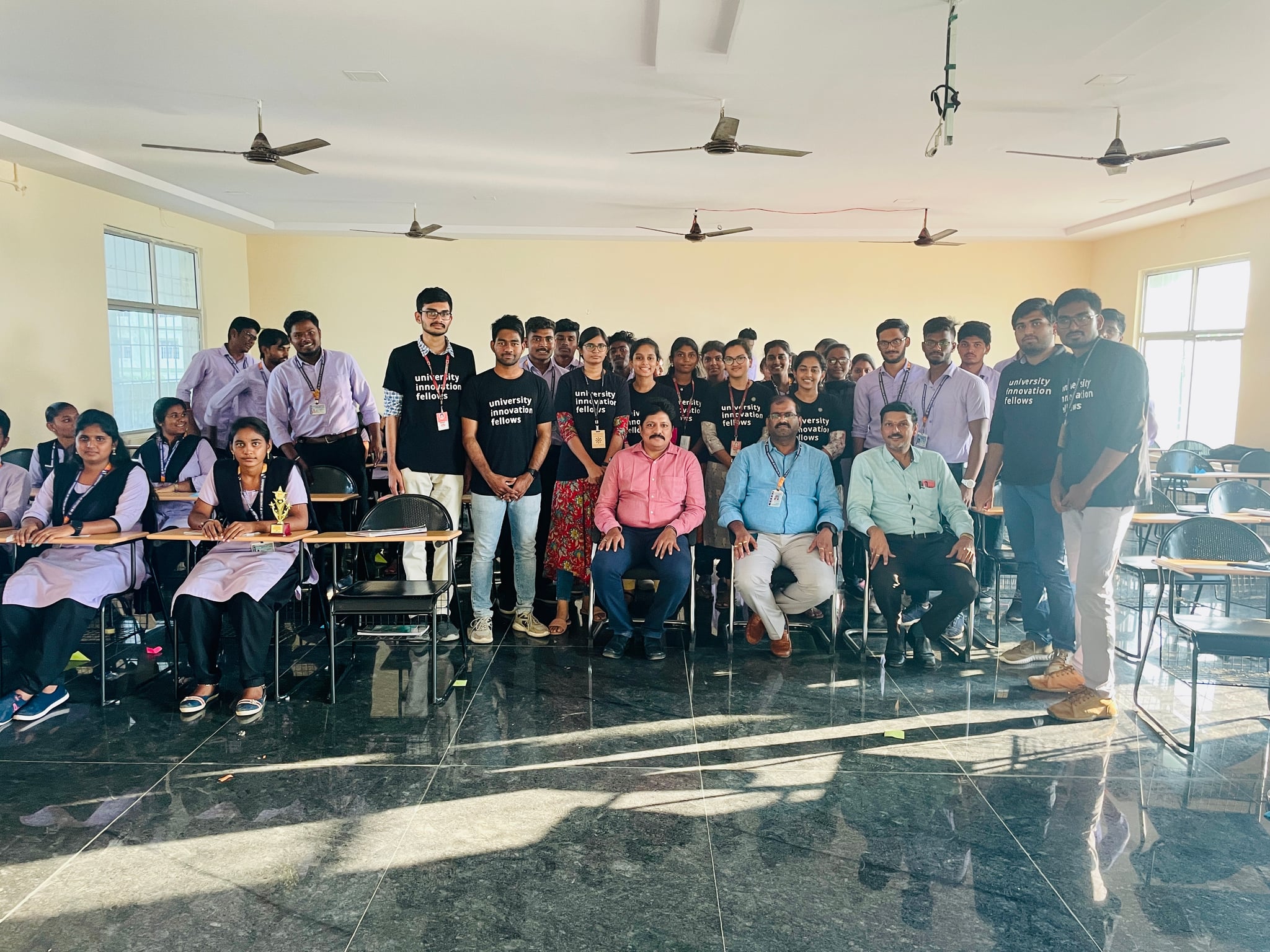 UIF team with students and faculty in a classroom setting