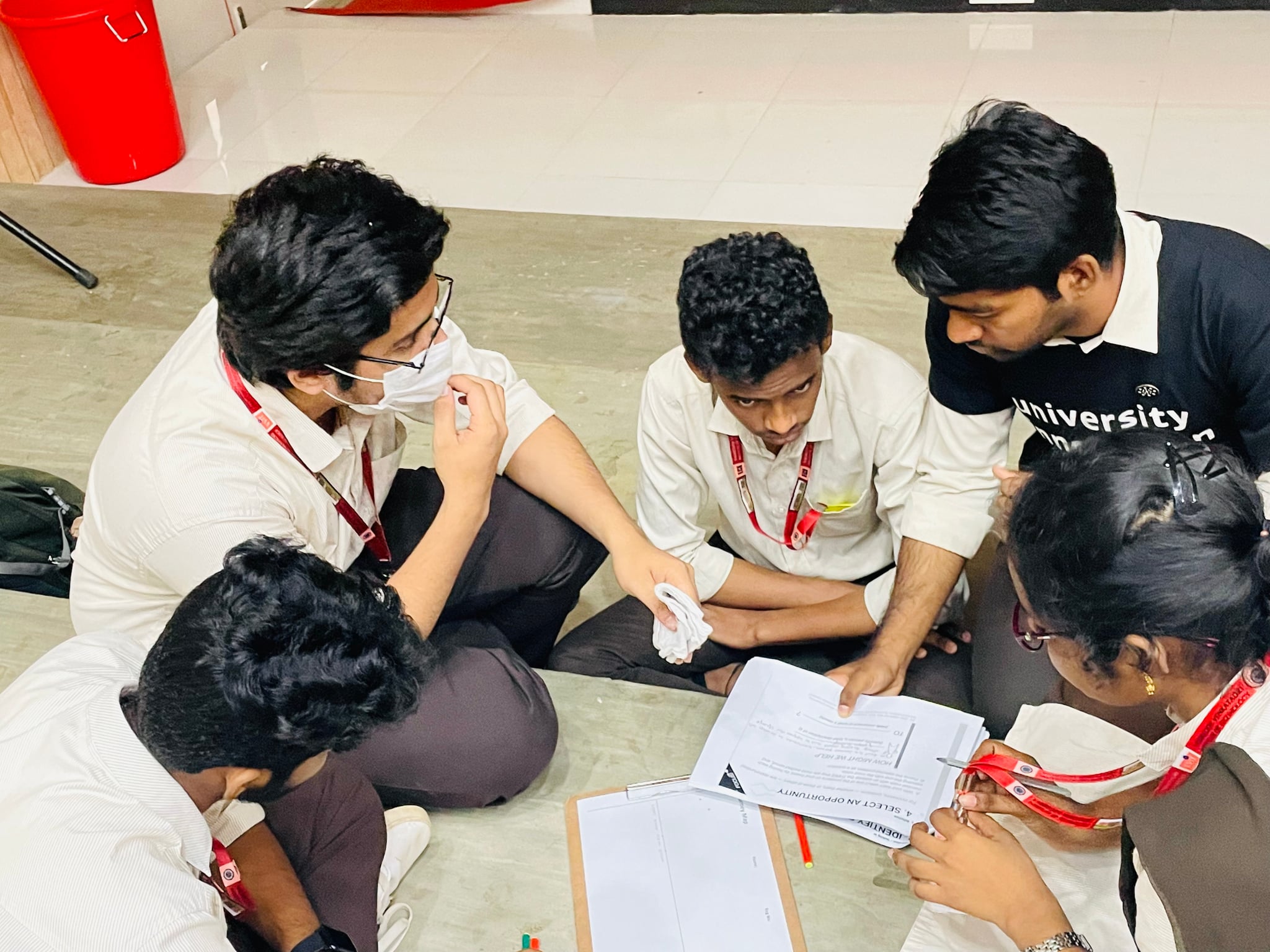 Students collaborating on a design thinking exercise during a workshop